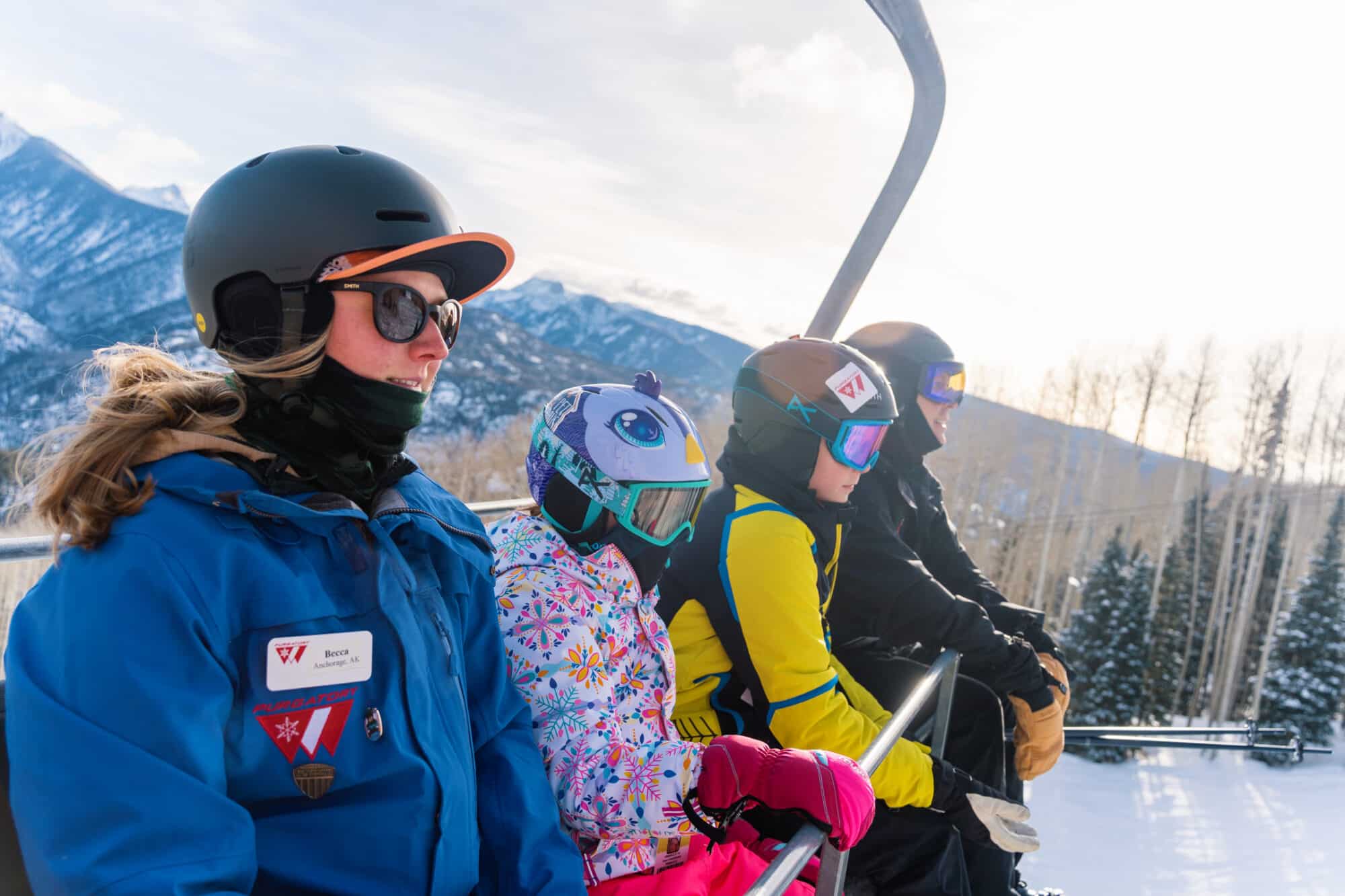 Ski school group takes in the views from the chairlift