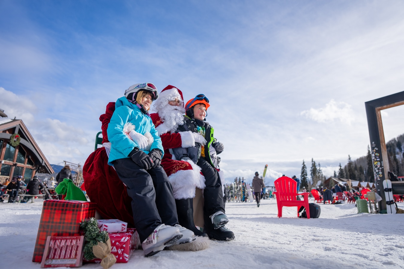 children sit on santa's lap for the holidays