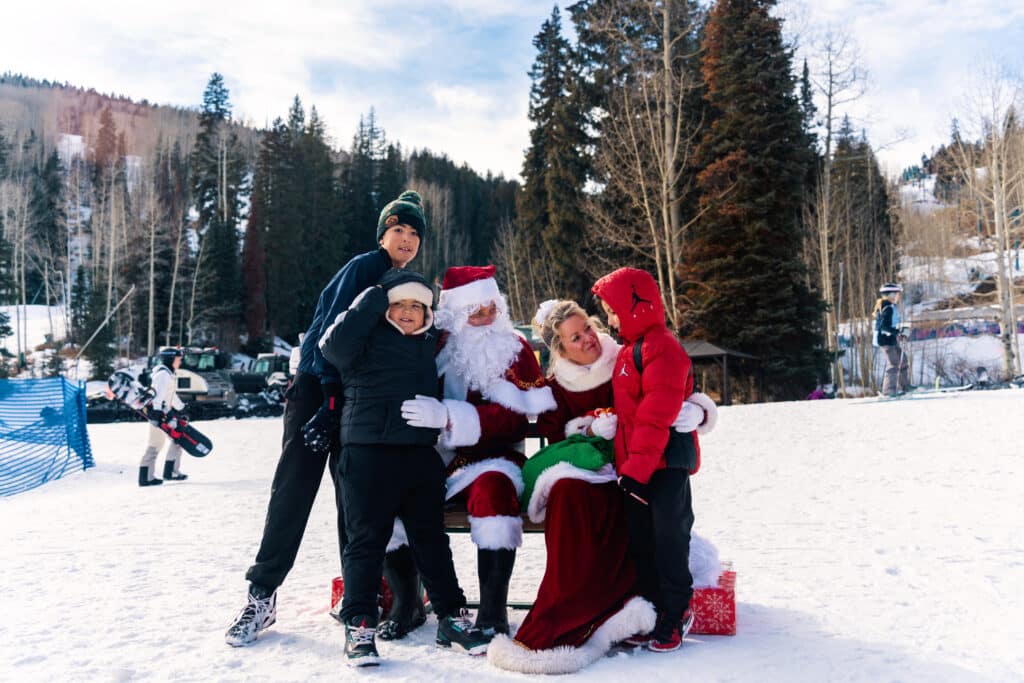 santa and mrs. claus with kids