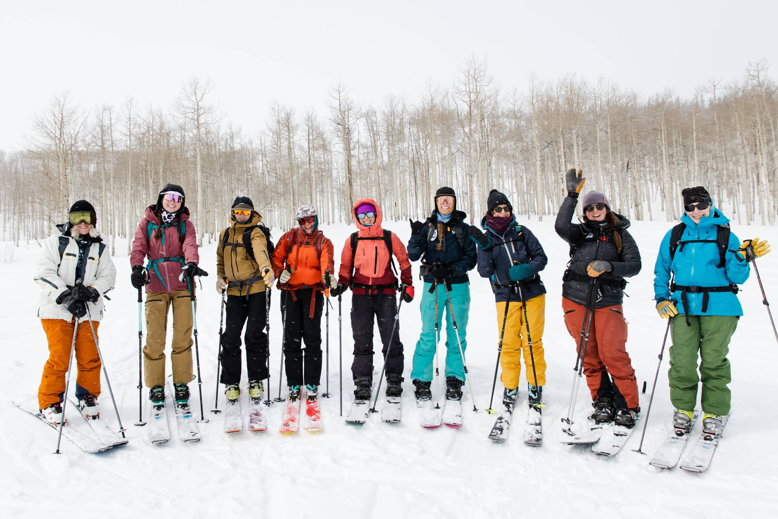 Women skiing and riding together